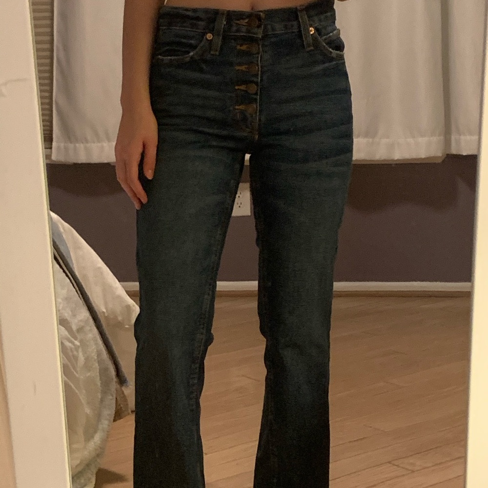 Blue wide leg distressed jeans